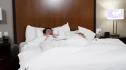 Blonde Stepmom and Stepson Share Hotel Bed