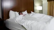 Blonde Stepmom and Stepson Share Hotel Bed