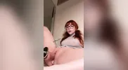 cute redhead having an explosive orgasm with fuck machine and buttplug