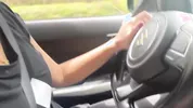 I give the finger to the taxi driver on a busy road in Colombia