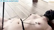 Slim girl gagged, bound with a crotch rope, nipple clamps and made to cum