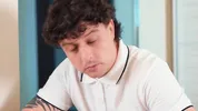 Shy teacher rewarding good student for excellent study