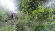 Two busty and big-assed women and an old man have a threesome in the jungle
