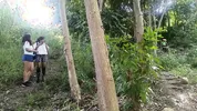 Two busty and big-assed women and an old man have a threesome in the jungle