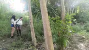 Two busty and big-assed women and an old man have a threesome in the jungle