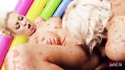 Jello wrestling and passionate fingering with two busty playful blondes