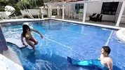 A scorned Latina finds a mermaid man and to get even she decides to suck his cock and fuck him