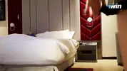 Stepmom Alina Rai jumps on stepson's cock in hotel room