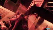 Outside the stables the brunette milf gets her fake boobs fondled while in doggy style