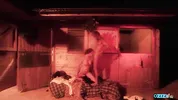 Outside the stables the brunette milf gets her fake boobs fondled while in doggy style