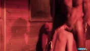 Outside the stables the brunette milf gets her fake boobs fondled while in doggy style