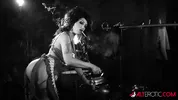 Luna Luxxx teasing in a black and white classic scene