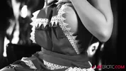 Luna Luxxx teasing in a black and white classic scene