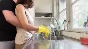 I was doing the dishes but my horny husband didn't let me finish and fucked me from behind in the kitchen