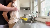 I was doing the dishes but my horny husband didn't let me finish and fucked me from behind in the kitchen