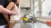 I was doing the dishes but my horny husband didn't let me finish and fucked me from behind in the kitchen