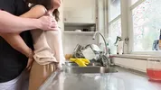 I was doing the dishes but my horny husband didn't let me finish and fucked me from behind in the kitchen