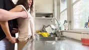 I was doing the dishes but my horny husband didn't let me finish and fucked me from behind in the kitchen