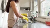 I was doing the dishes but my horny husband didn't let me finish and fucked me from behind in the kitchen