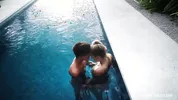 Innocent french kiss in the pool turns into intense sex
