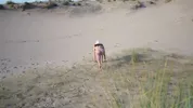 LUCKY VOYEUR FUCKS A BIG ASS STRANGER ON THE NUDIST BEACH WHILE SHE'S DOING NAKED YOGA... BIG CREAMPIE