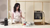 On the film set, the cameraman fucked a feminine makeup artist and a busty food blogger.