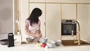 On the film set, the cameraman fucked a feminine makeup artist and a busty food blogger.