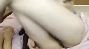 Home fisting in front of a laptop