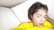 beautiful young Colombian girl lets her face be filled with milk during the World Cup