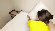 beautiful young Colombian girl lets her face be filled with milk during the World Cup