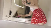 Wonderfully beautiful cute and nice college girl in a polkadot mini skirt shows her lace panties and ass