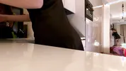 Hot sexy long legs brunette wife in black and red fishnet stockings with a satin nightie teases in the kitchen