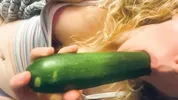 Dumb blonde farm girl keeps fucking herself with her fresh produce. Takes zucchini and squirts a lot