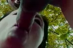 Young brunette loves to suck a big cock outdoors
