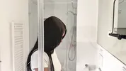 Hot sexy slim tight pussy beauty in the bathroom prepares for night out in a pink cut mini skirt
