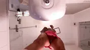 Hot sexy slim tight pussy beauty in the bathroom prepares for night out in a pink cut mini skirt