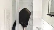 Hot sexy slim tight pussy beauty in the bathroom prepares for night out in a pink cut mini skirt