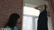 Handyman analyzes slim brunette after finishing the work