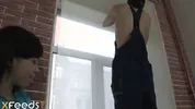 Handyman analyzes slim brunette after finishing the work
