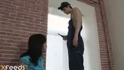 Handyman analyzes slim brunette after finishing the work