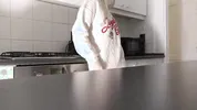 Amazingly beautiful petite blonde hot college girl in her dormitory kitchen getting ready for Christmas Party
