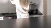 Amazingly beautiful petite blonde hot college girl in her dormitory kitchen getting ready for Christmas Party