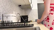 Super hot girl in no panties in a fully see through transparent dress in the kitchen to flash pussy