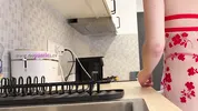 Super hot girl in no panties in a fully see through transparent dress in the kitchen to flash pussy
