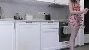 Super hot girl in no panties in a fully see through transparent dress in the kitchen to flash pussy