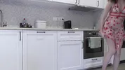 Super hot girl in no panties in a fully see through transparent dress in the kitchen to flash pussy