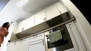 Super hot girl in no panties in a fully see through transparent dress in the kitchen to flash pussy