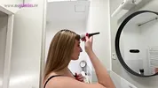 Amazingly beautiful college girl in the bathroom with a super skirt miniskirt shows her ass