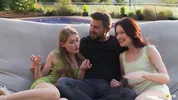 Petite girls Tiffany Tatum and Matty Perez share one big dick outdoors, sucking and fucking on the lawn