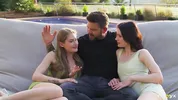 Petite girls Tiffany Tatum and Matty Perez share one big dick outdoors, sucking and fucking on the lawn